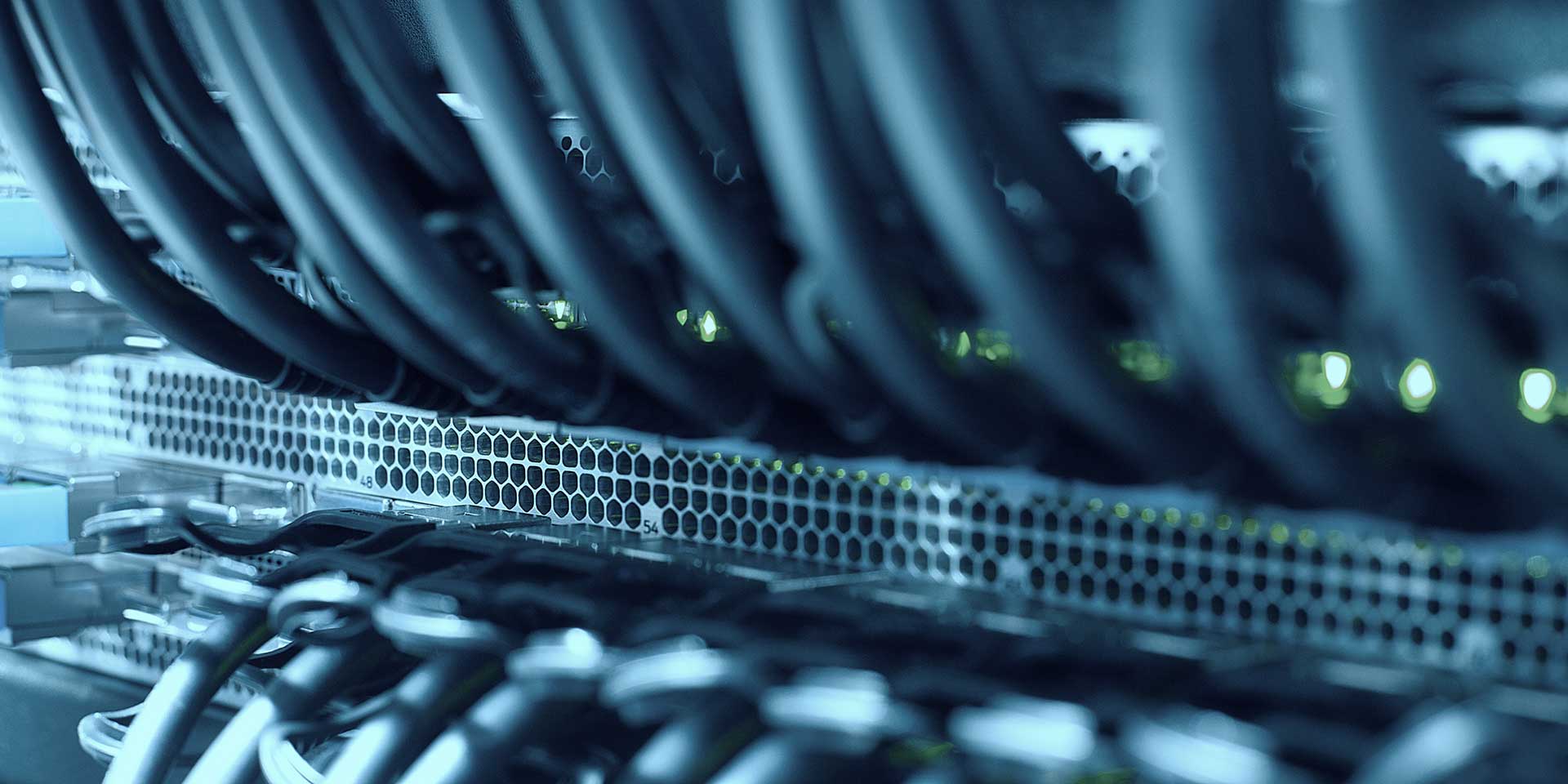 Network engineer working on data centre switching hardware